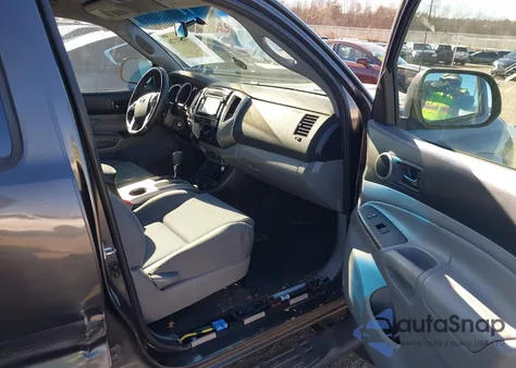 2015 Toyota Tacoma Base V6 из США, поврежденный, VIN 3TMLU4EN9FM198841